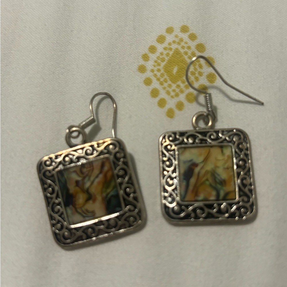 Silver tone earrings with marbleized center